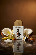 La African Drummer Lattafa Pride 20ml – Foto editorial de lujo sobre mármol oscuro con ámbar cálido